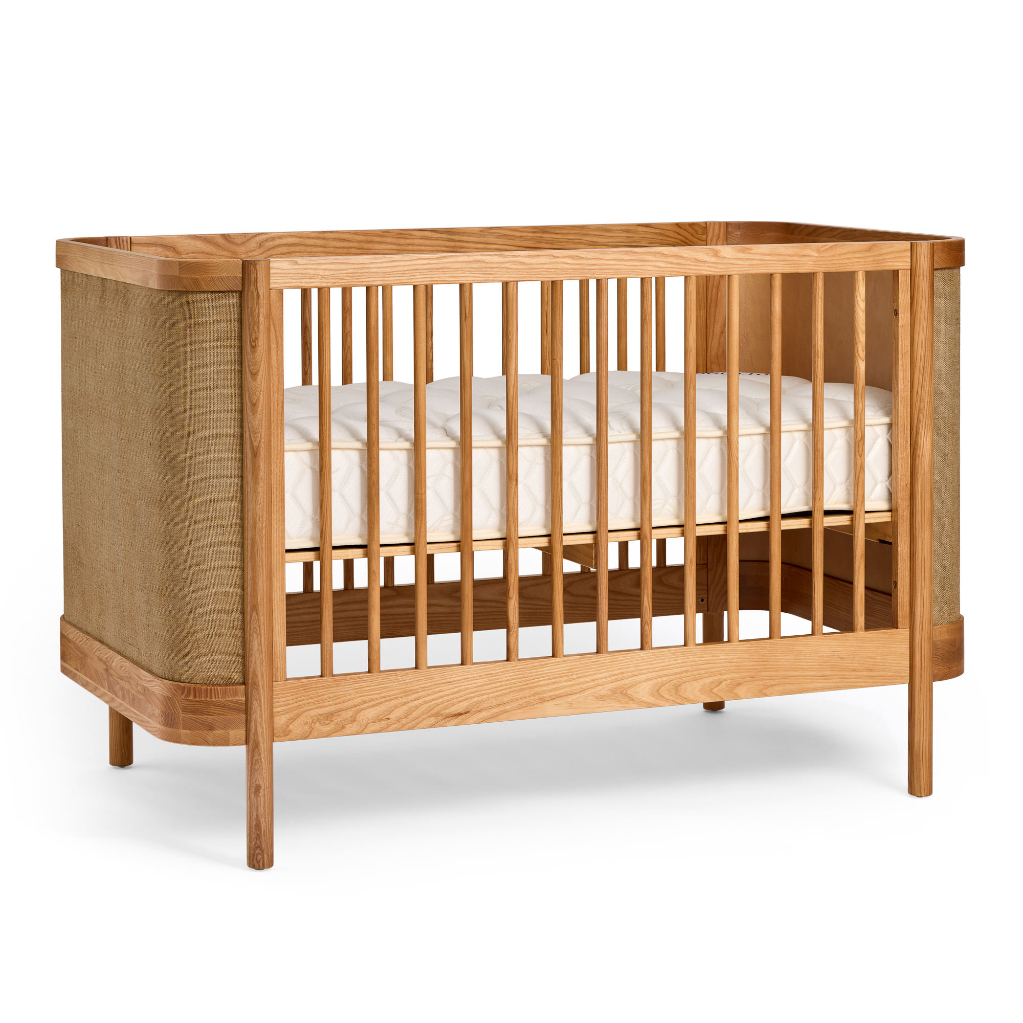 Indi Cot with a white mattress on a white background