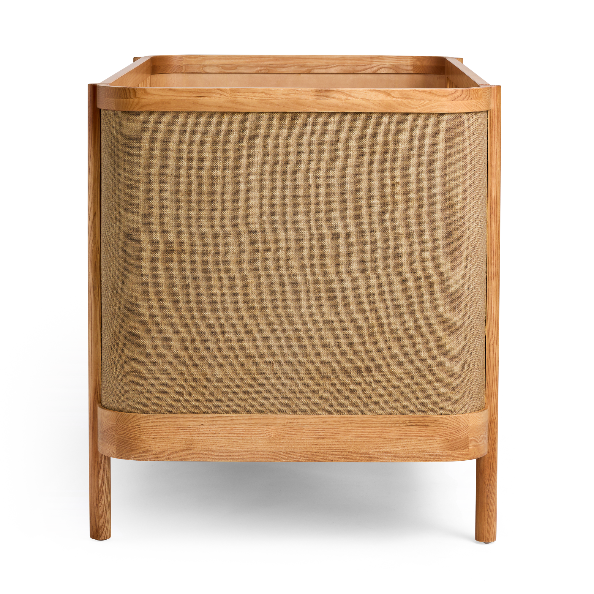 Indi Cot with a textured brown fabric cover on a white background