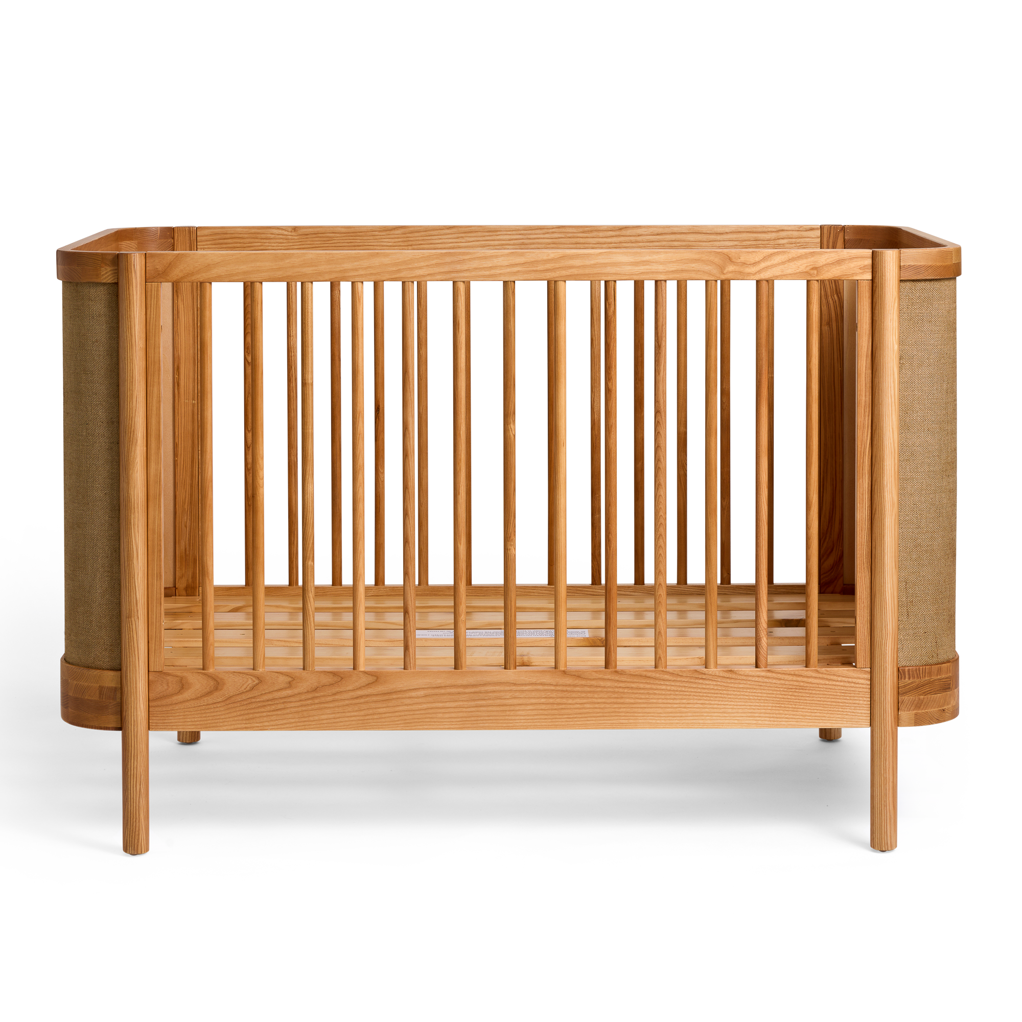 Indi Cot with a natural finish on a white background