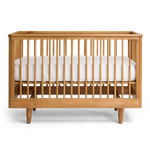 George Cot on a side with mattress on a white background