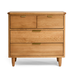 Wooden dresser with four drawers on a white background