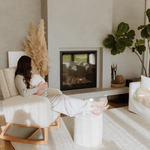 Mother with baby using Myla chair and Mylo ottoman